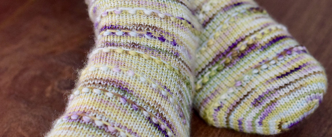 String of Bobbles Socks by Zsuzsanna Orthodoxou